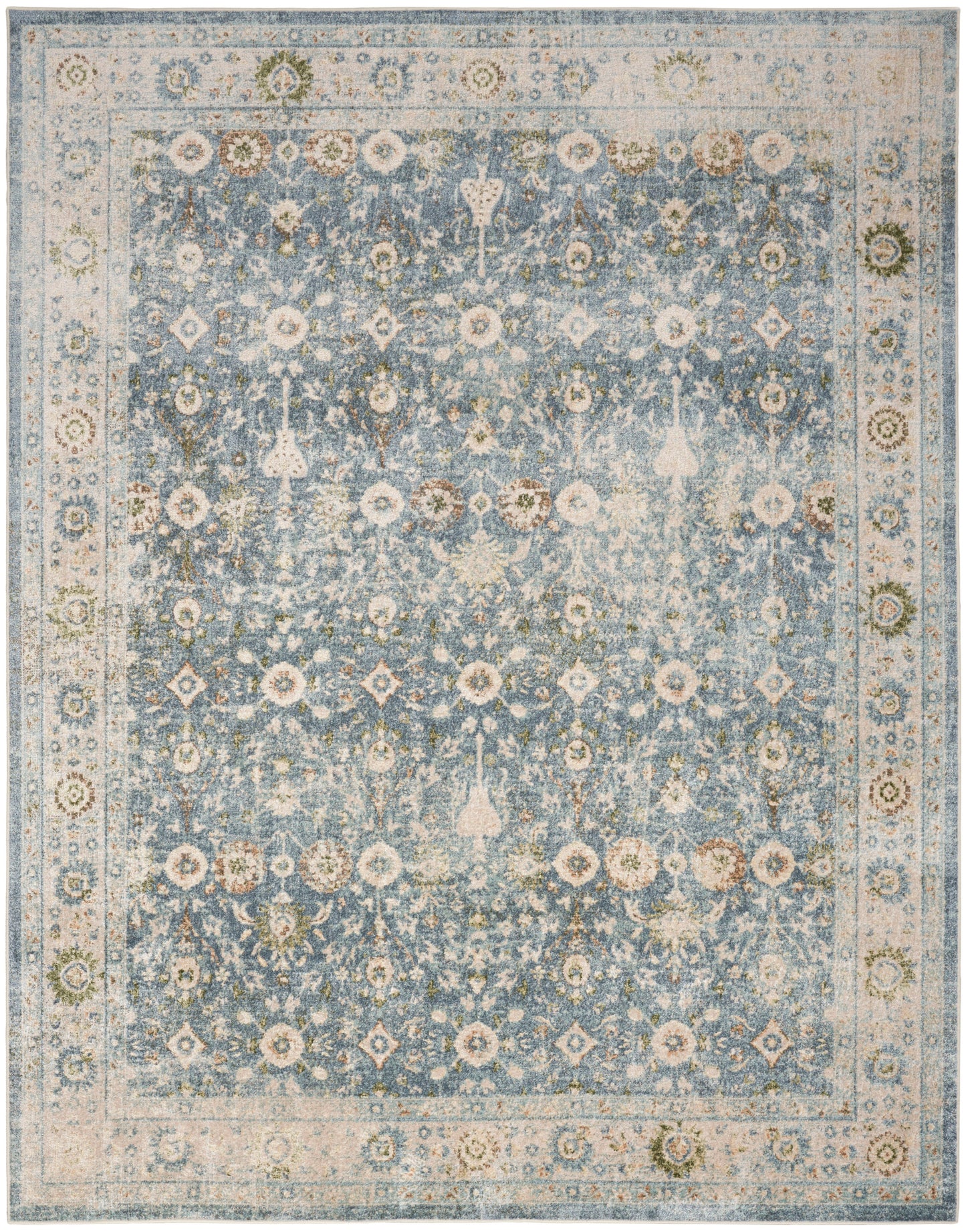 Blue distressed oriental rug with ivory border, cream floral motifs and faded vintage medallion patterns.