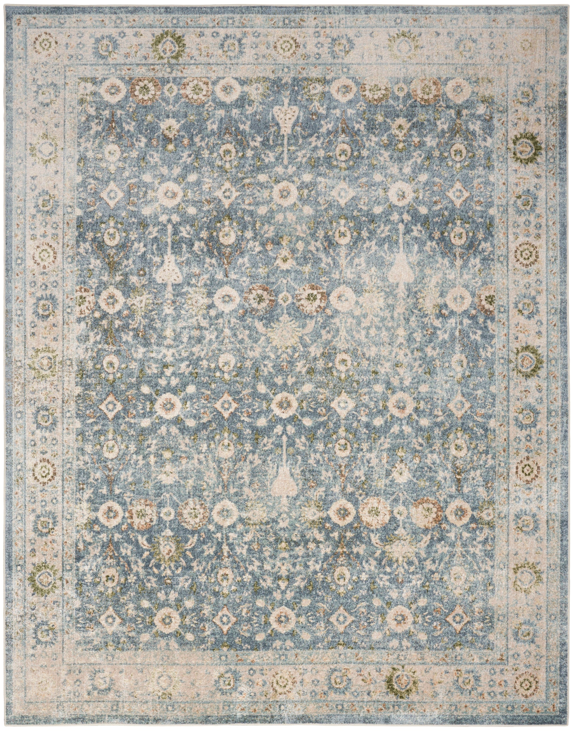 Blue distressed oriental rug with ivory border, cream floral motifs and faded vintage medallion patterns.