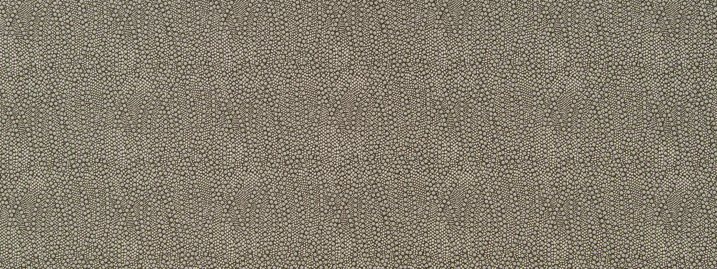 Beige woven fabric with subtle ripple texture and repeating teardrop motif, suitable for upholstery.