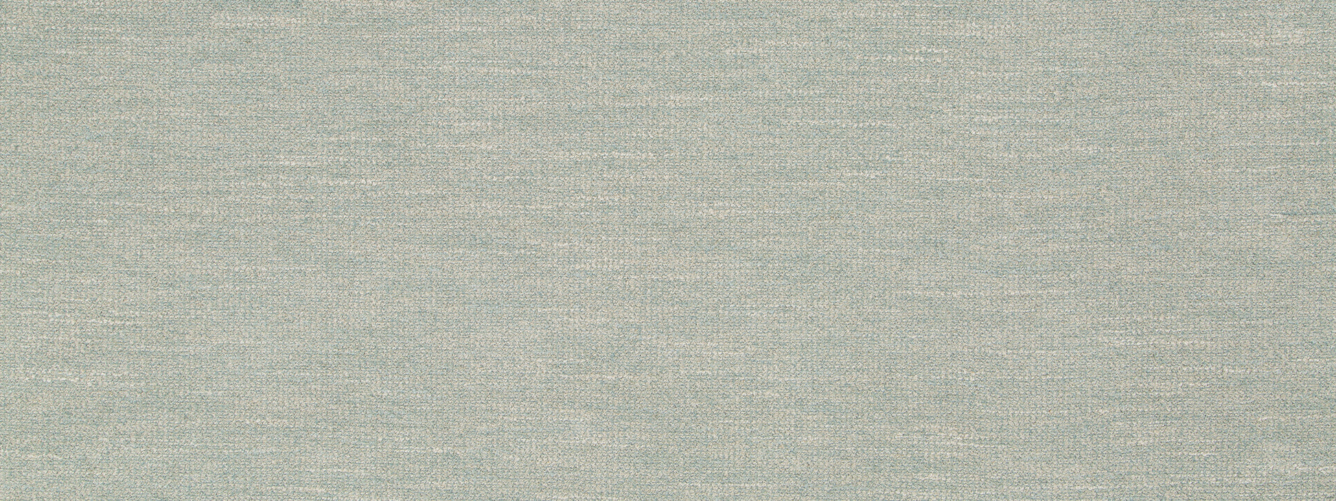 Close-up of light sage-green boucle upholstery fabric texture.