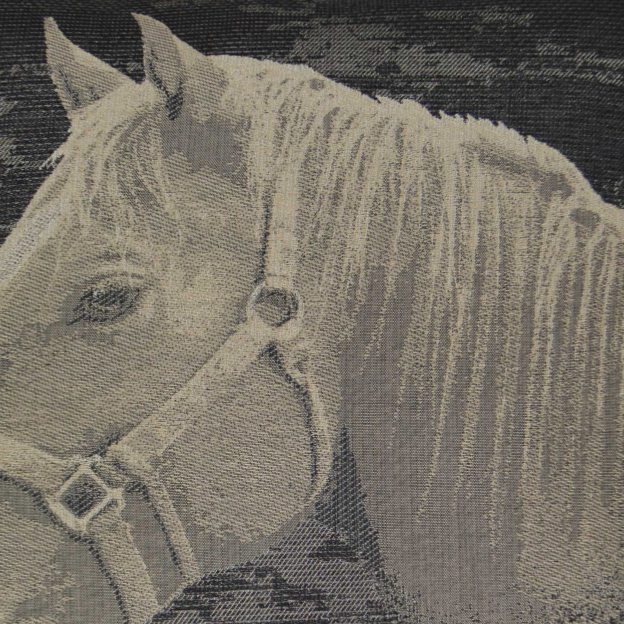 Cream horse head in profile with bridle on dark fabric; vintage halftone textile print.