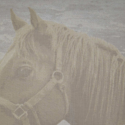 Beige horse head pillow with a bridle motif on ivory fabric.