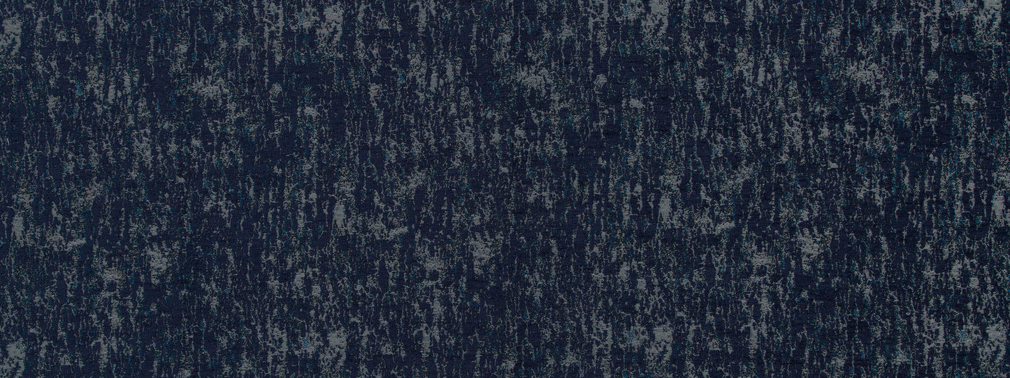 Dark blue textured denim-like upholstery fabric swatch with a speckled, weathered finish.