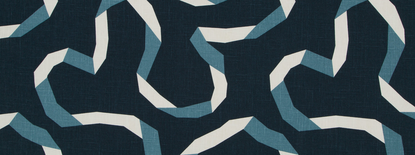 Abstract geometric fabric print with an interlocking navy backdrop and white and teal ribbon motifs; a modern textile pattern.