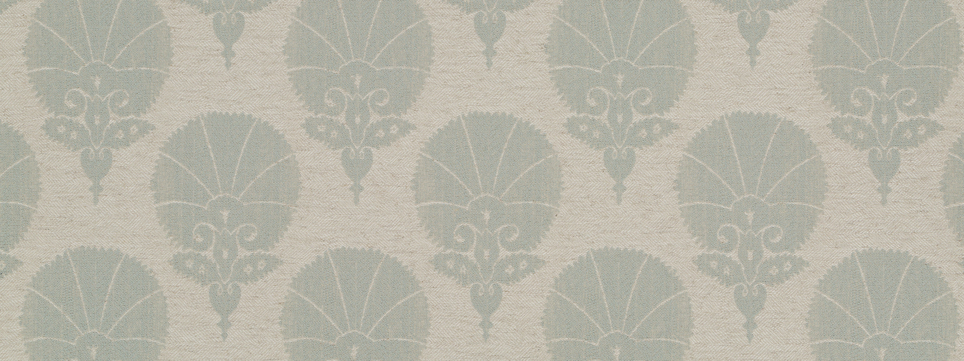 Muted teal damask pattern on warm beige upholstery fabric with shell-like motifs; vintage-inspired.