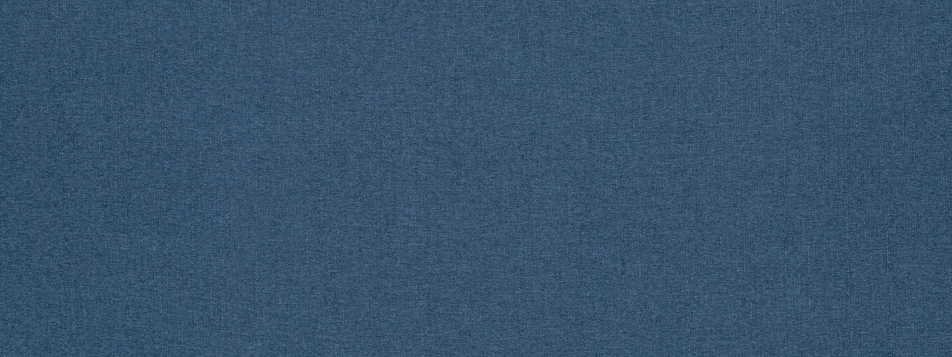 Dark blue denim-like fabric close-up with visible weave texture.