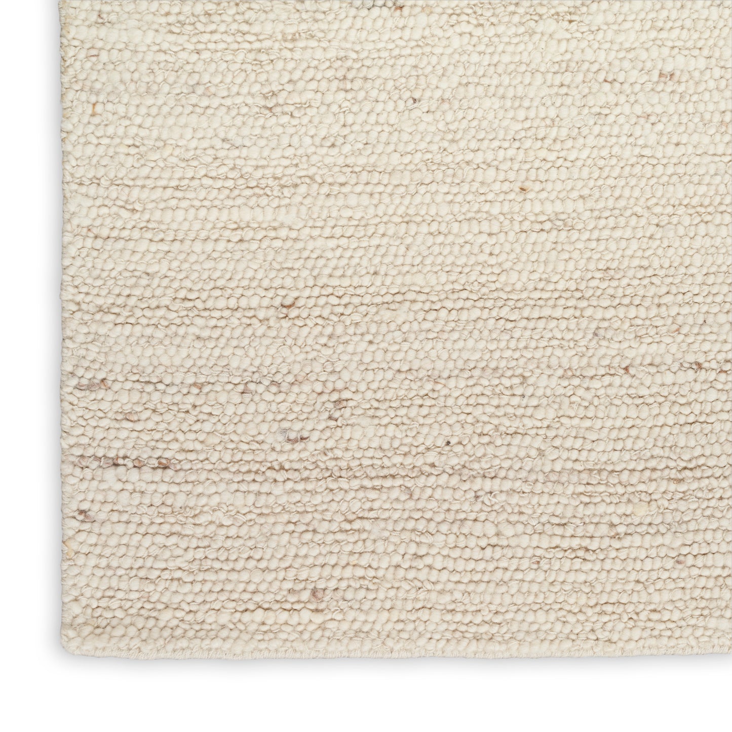 Cream boucle rug with plush loop pile, cotton blend, rectangular & neutral for cozy living room decor.