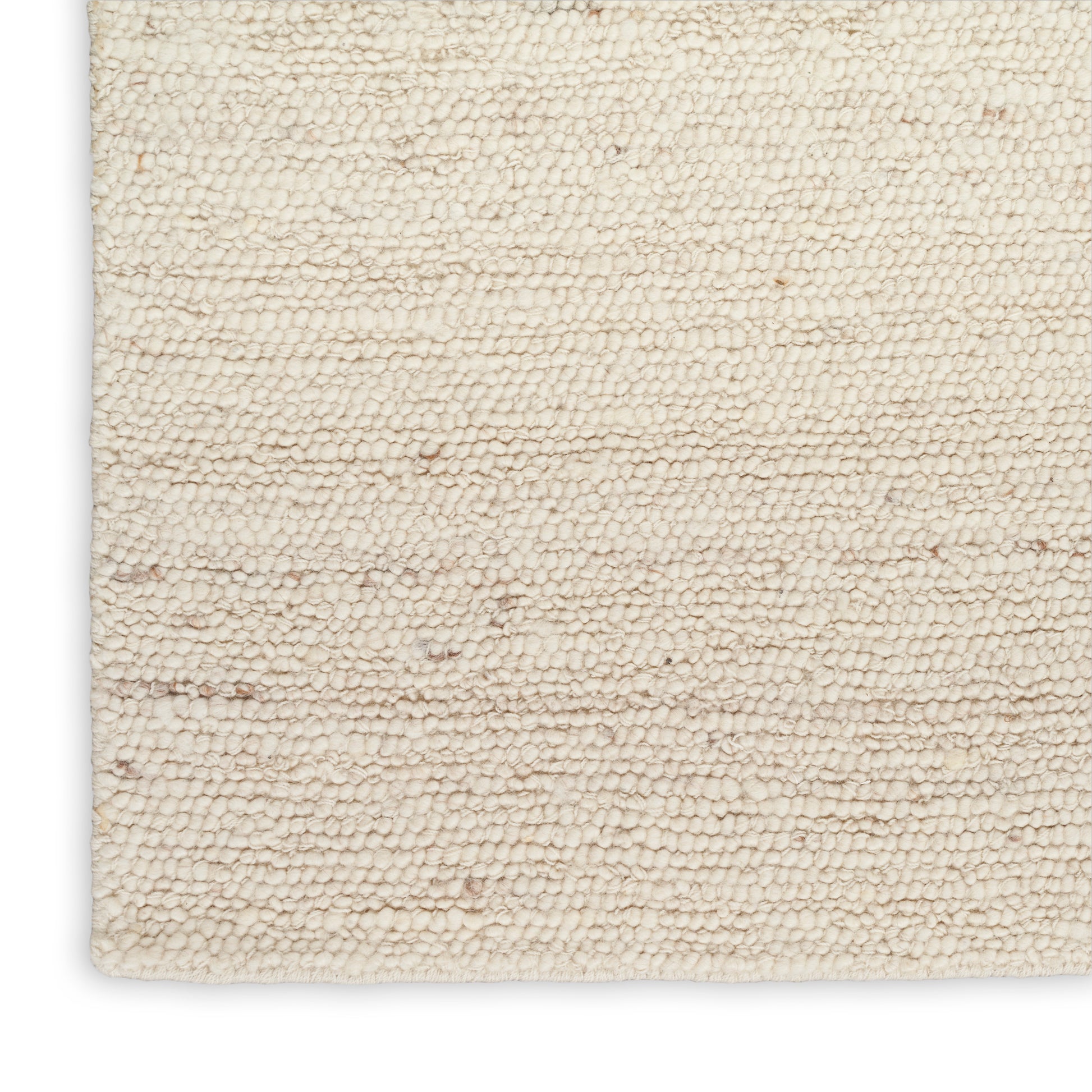 Cream boucle rug with plush loop pile, cotton blend, rectangular & neutral for cozy living room decor.