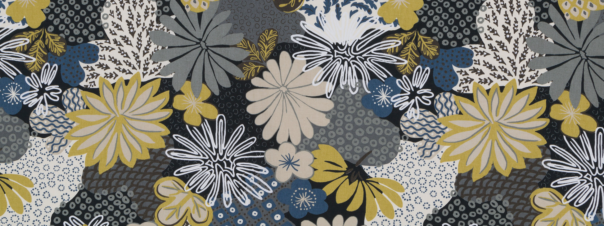Floral fabric pattern with large yellow, white, blue and gray flowers on a dark background; modern botanical print.
