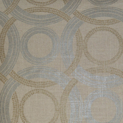 Beige pillow fabric with overlapping light blue and taupe circular rings; retro geometric motif.