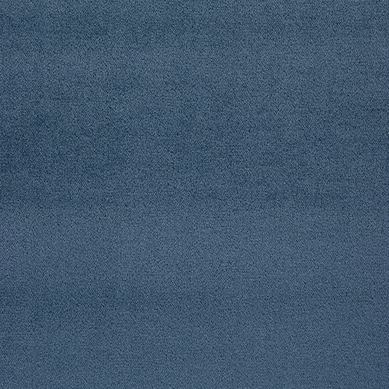 Blue-grey plush velvet fabric texture with a soft nap and subtle color variations.