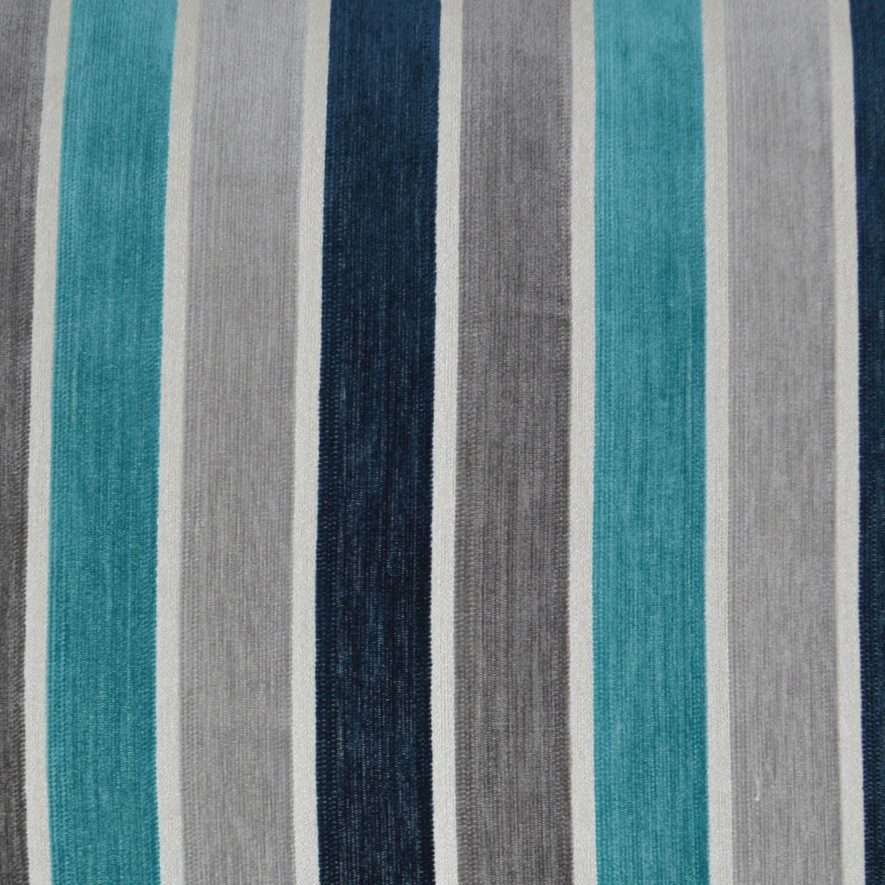 Vertical striped fabric in teal, light gray, navy, and gray with even-width stripes for upholstery or apparel.