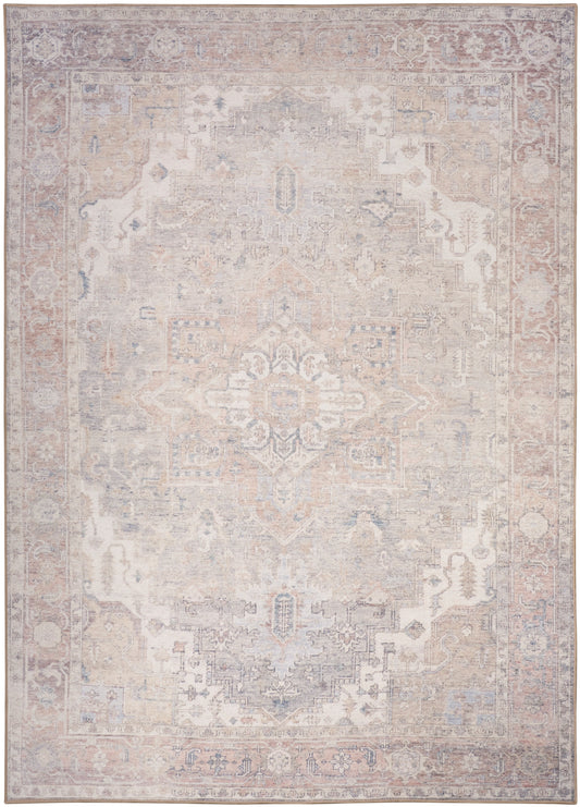 Rectangular distressed vintage rug in ivory, blush and pale blue-gray with a Persian-inspired central medallion.