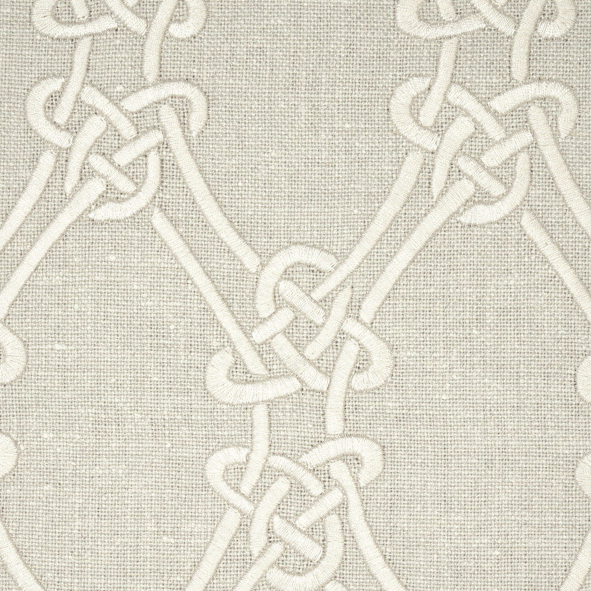 Cream rope knot pattern on beige linen fabric; decorative geometric chain design.
