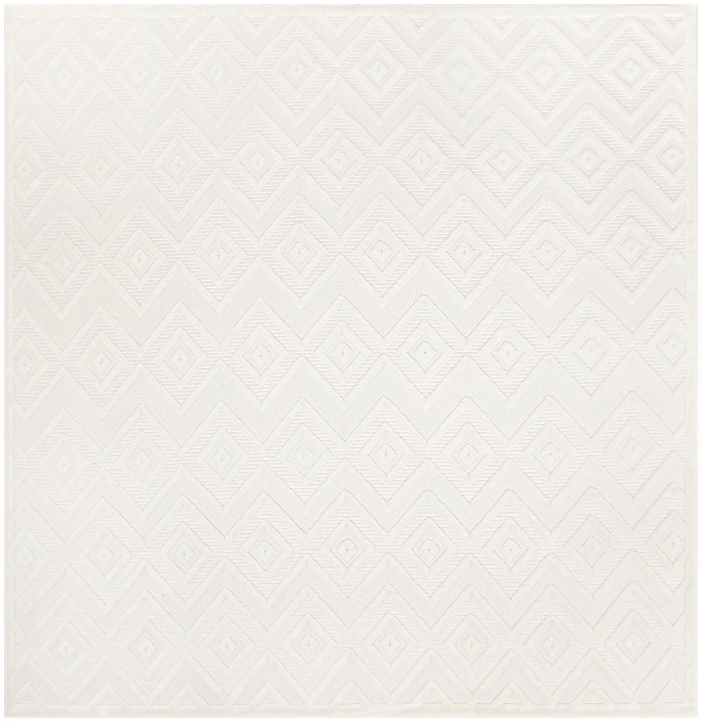 Cream rug with subtle embossed diamond geometric pattern in ivory tones; textured, soft and decorative.