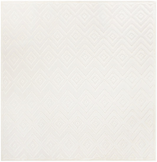 Cream rug with subtle embossed diamond geometric pattern in ivory tones; textured, soft and decorative.