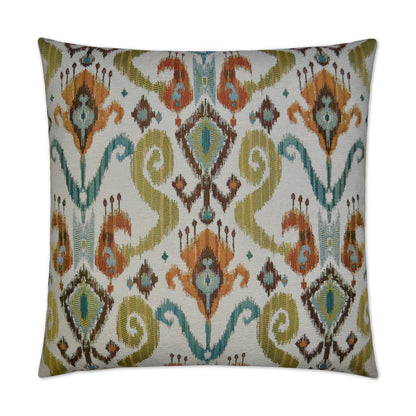 Decorative throw pillow with ikat-inspired geometric pattern in teal, orange, olive green & brown on a light background.