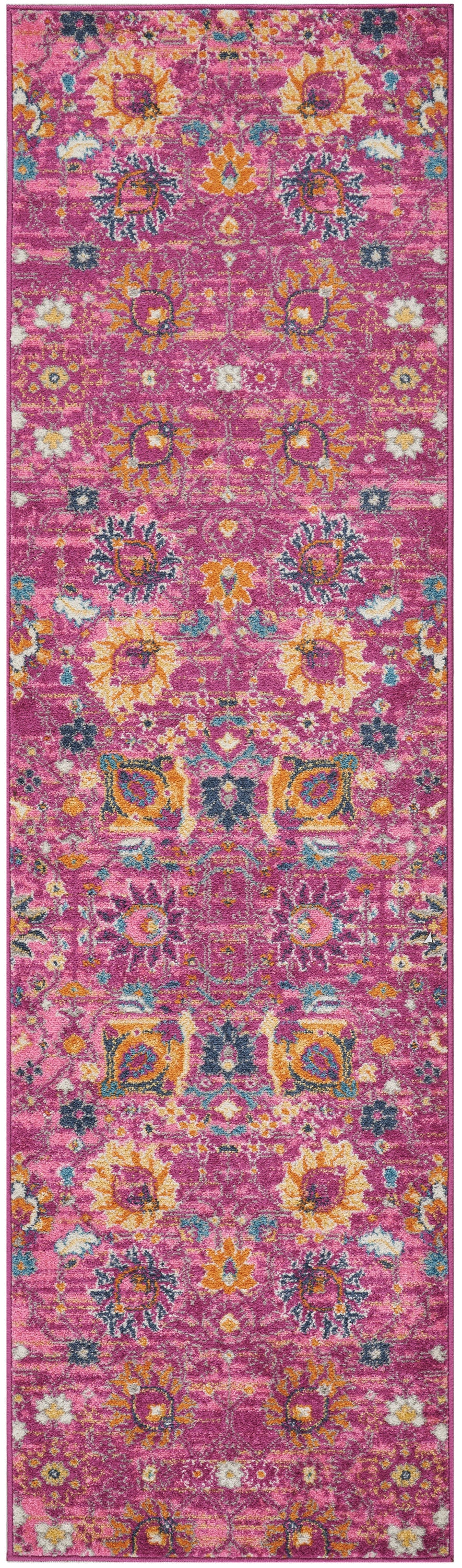 Vibrant pink Persian-style runner rug with multicolor floral motifs in yellow, orange, blue, and white.