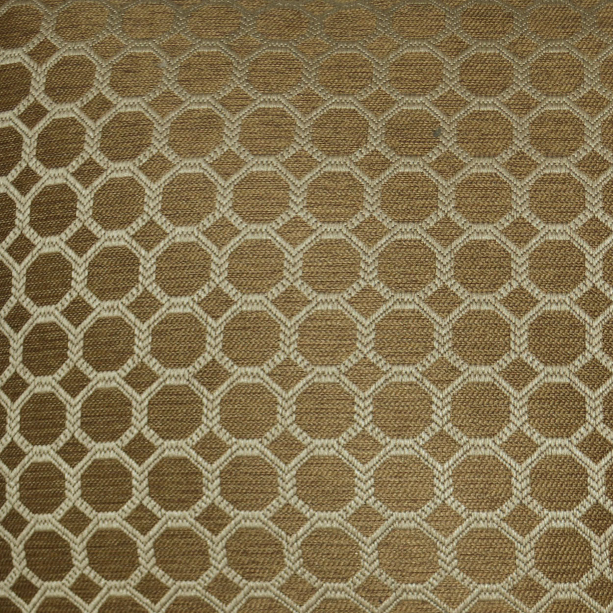 Beige fabric with cream circular lattice pattern; honeycomb look for upholstery or drapery.