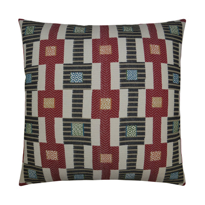Decorative throw pillow with red geometric pattern on a beige background.