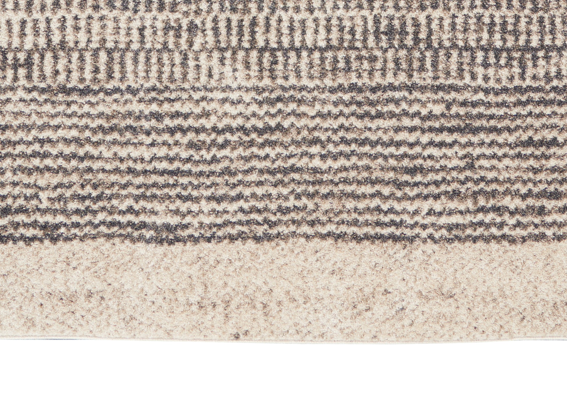 Beige and gray textured loop-pile rug with ribbed bands and soft wavy stripe pattern.