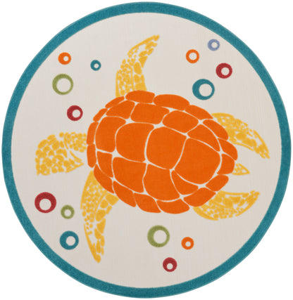 Round rug featuring an orange sea turtle with yellow fins on a beige background, teal border and colorful ring accents.