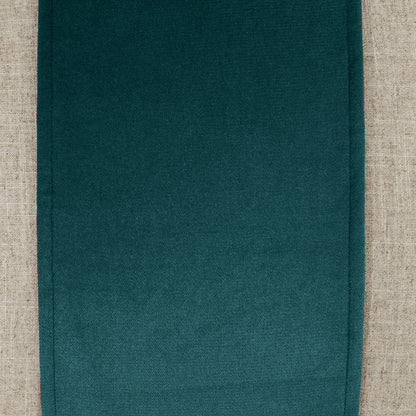 Deep teal woven fabric pillow with a textured surface; 24" x 24" square.