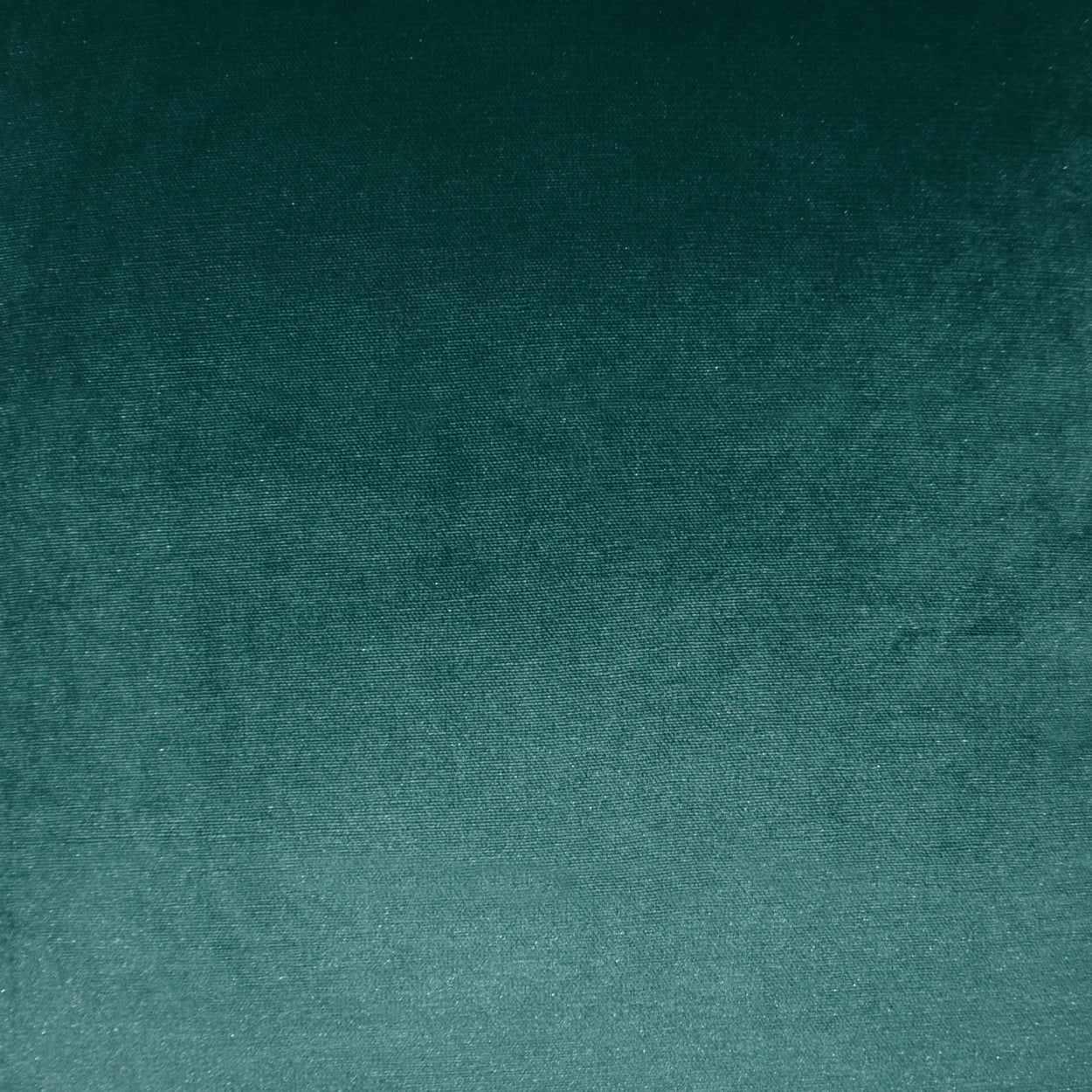 Teal-green velvet fabric with a subtle gradient and plush texture, ideal for upholstery or decorative accents.