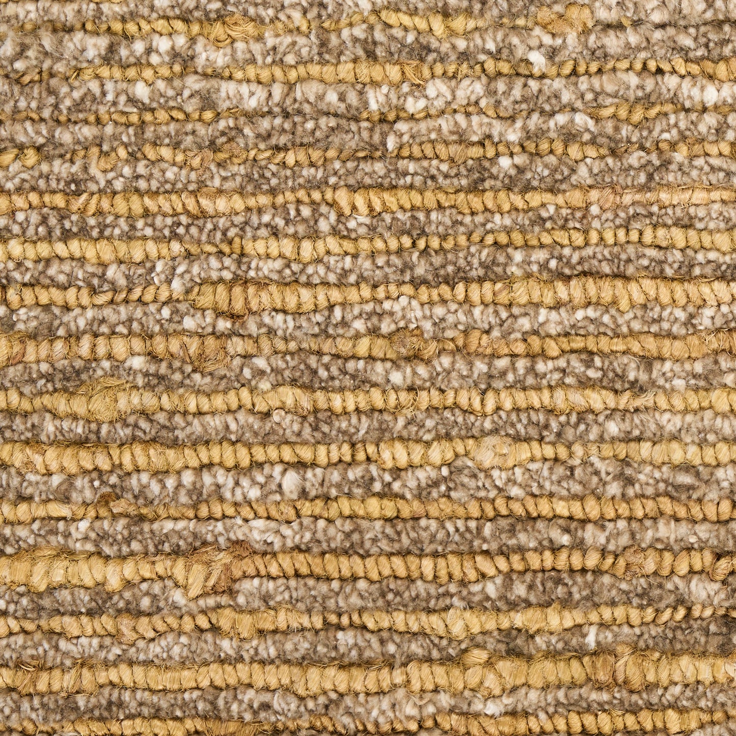 Close-up of a beige and tan striped looped-pile rug with chunky, textured weave.