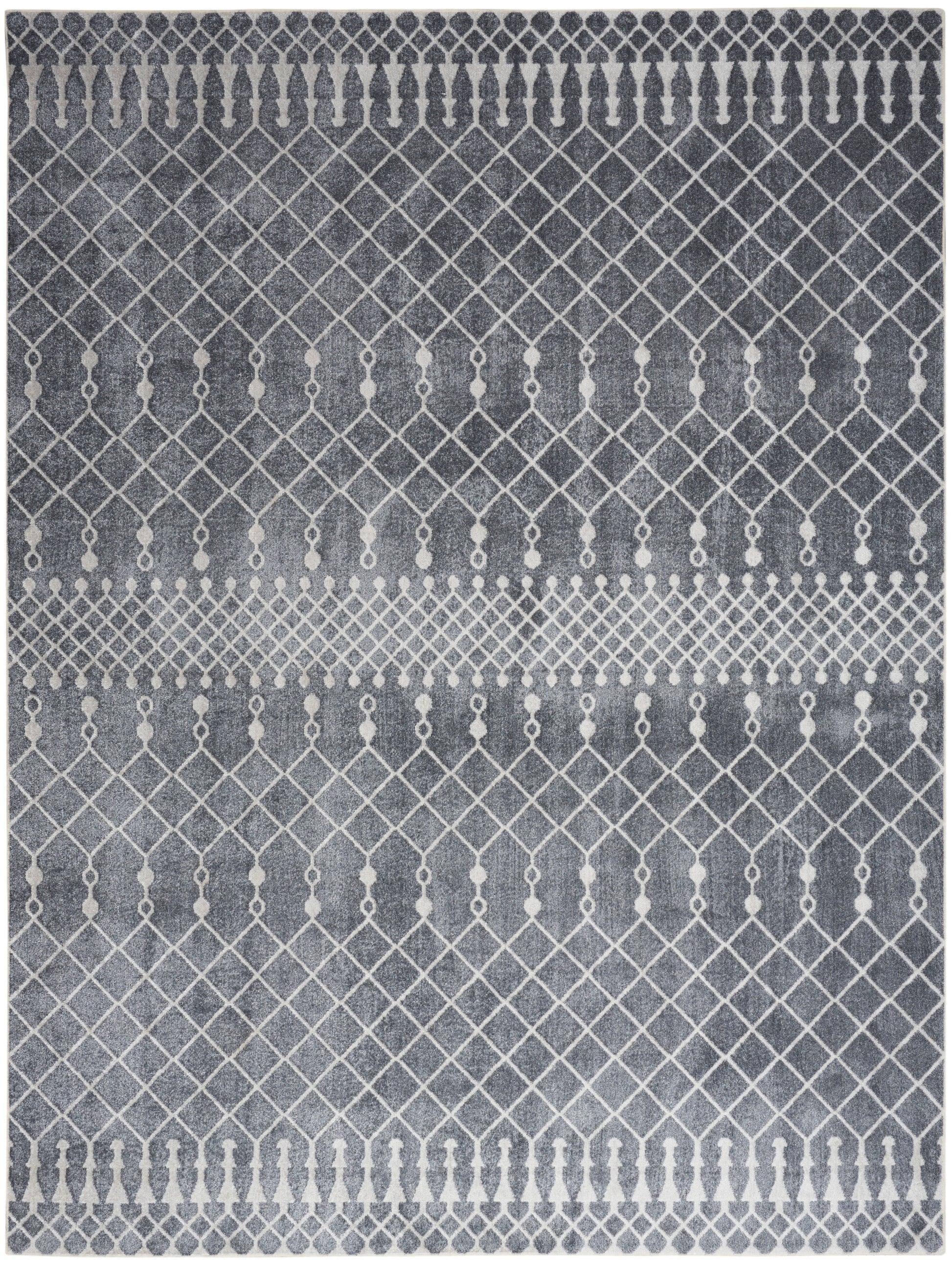 Gray area rug with white geometric lattice pattern and dot accents; modern decorative floor covering.