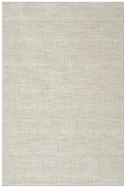 Beige rectangular rug with a subtle raised geometric grid pattern and soft textured pile.