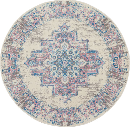 Round rug with distressed oriental medallion; cream base, blue and pink accents, taupe border.