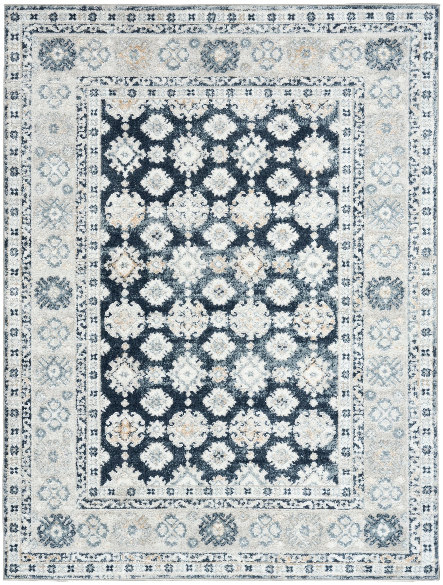 Persian-style area rug with dark navy central field and ivory-blue floral motifs, pale blue border.