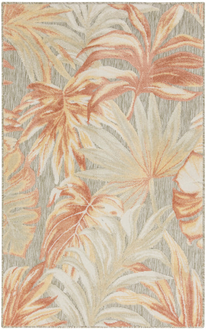 Rectangular tropical-pattern rug with peach, ivory and beige palm leaves on a light gray striped background.
