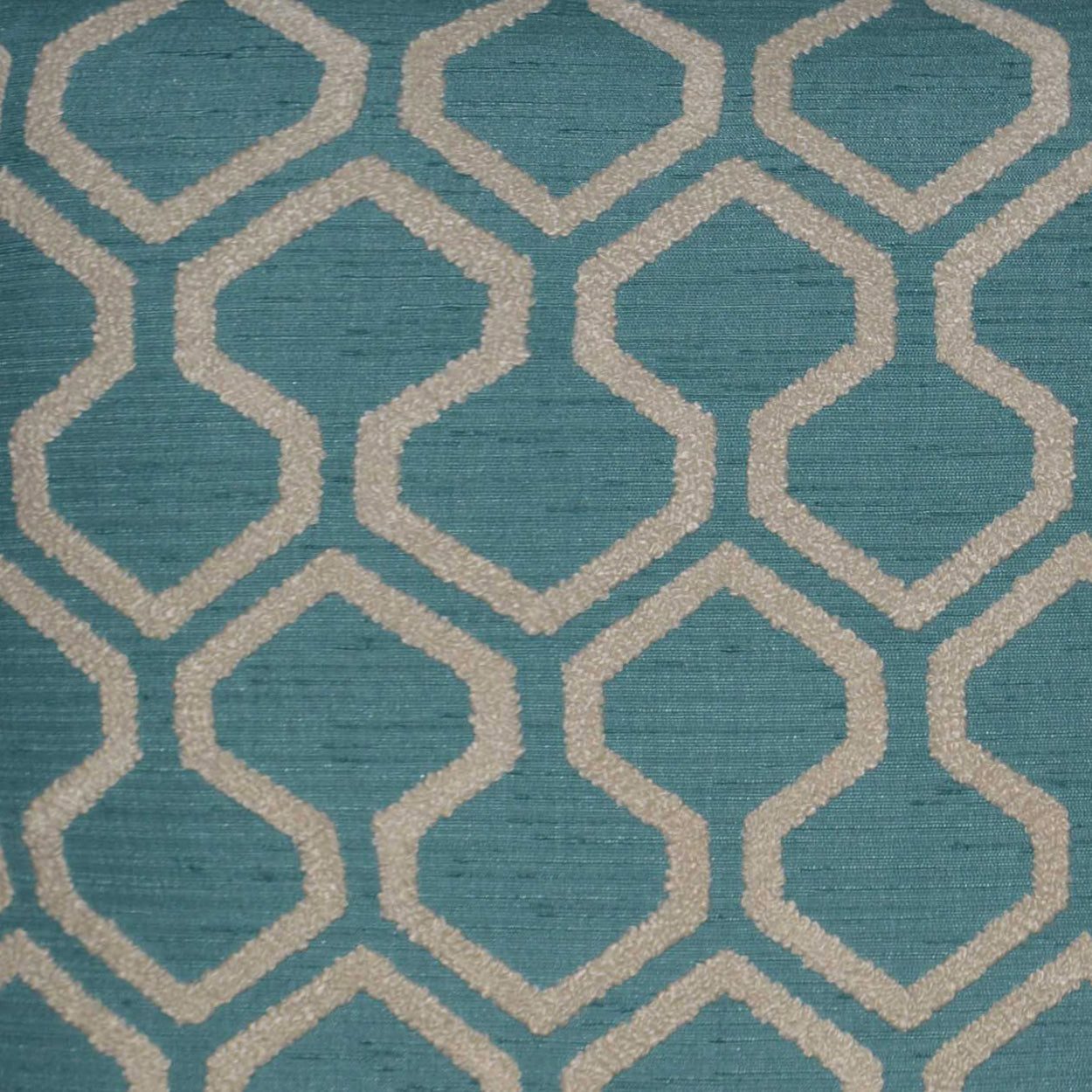 Teal pillow with cream interlocking diamond lattice pattern; turquoise nautical textured fabric; raw-edged pillow.