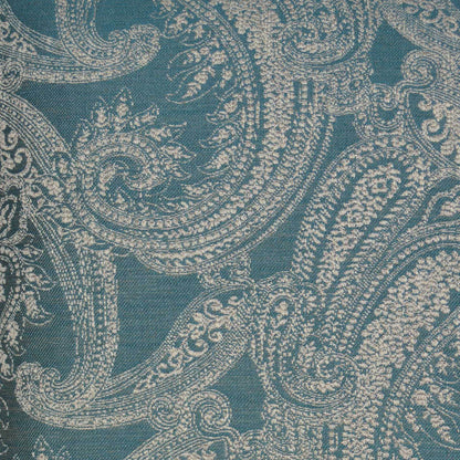 Teal pillow with an intricate ivory paisley damask pattern of swirling motifs.