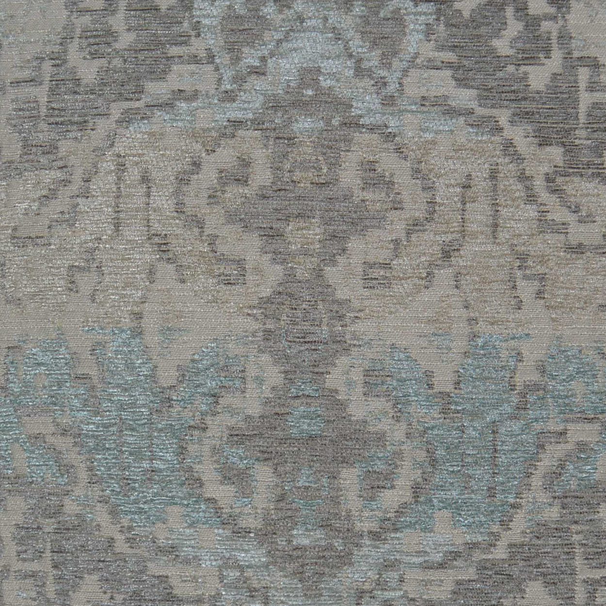 Damask-patterned pillow with ornate floral motifs in muted gray-beige and soft teal accents, 24" x 24