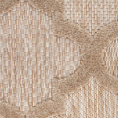 Beige woven rug with tan geometric diamond motifs and plush looped texture for a natural, cozy look.