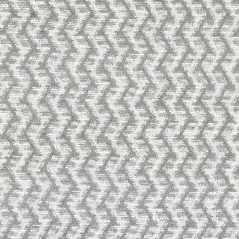 Gray chevron-patterned upholstery fabric swatch on the left with a solid light-gray panel on the right; modern geometric decor.