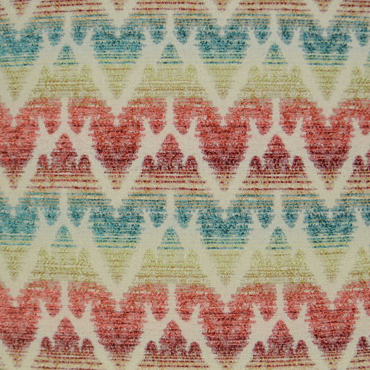 Pastel chevron-patterned fabric with repeating triangles in red, teal, yellow on cream, textured woven surface.