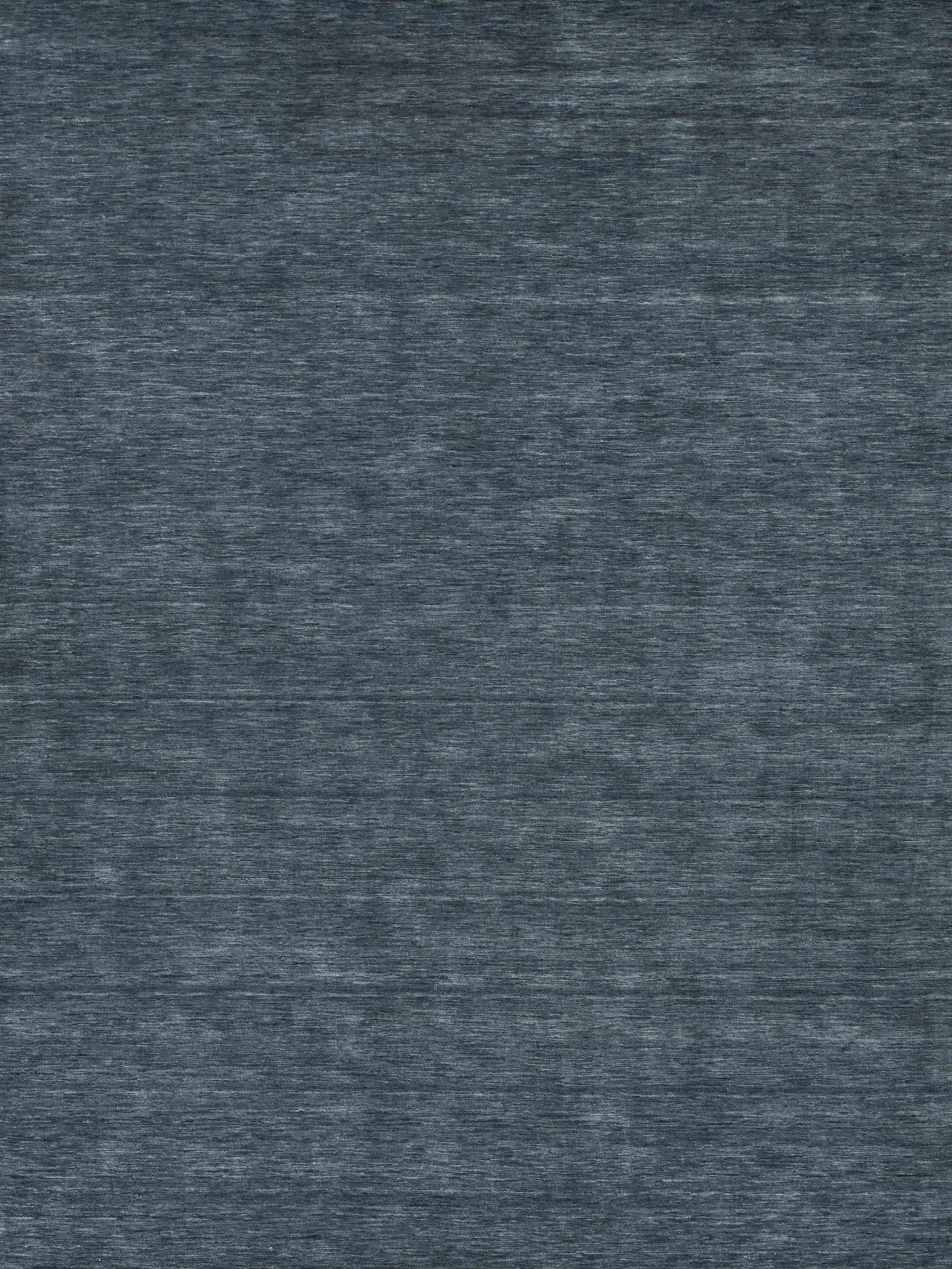 Dark blue heathered rug texture with subtle weave, denim-like material.