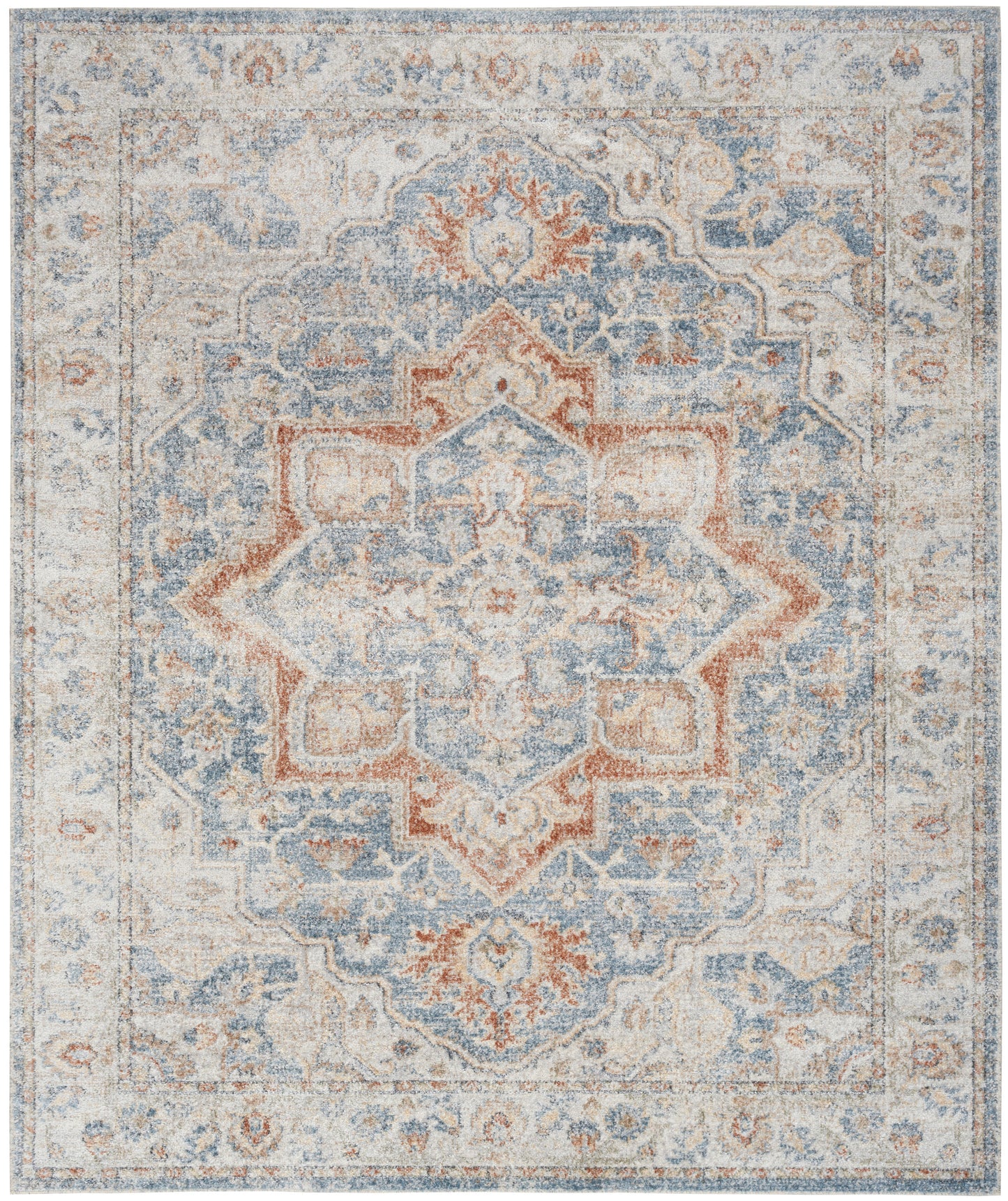 Distressed oriental area rug with ivory backdrop, blue and rust central medallion, floral border.