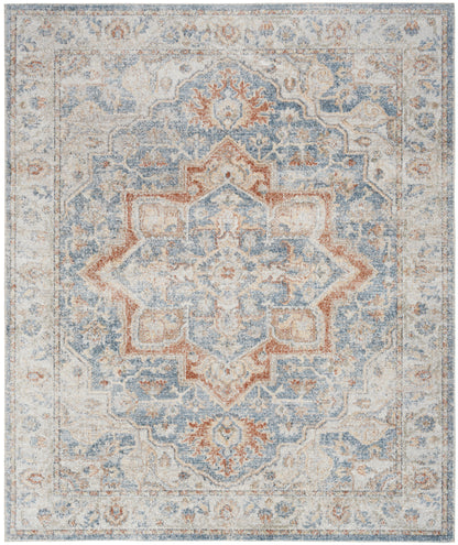 Distressed oriental area rug with ivory backdrop, blue and rust central medallion, floral border.