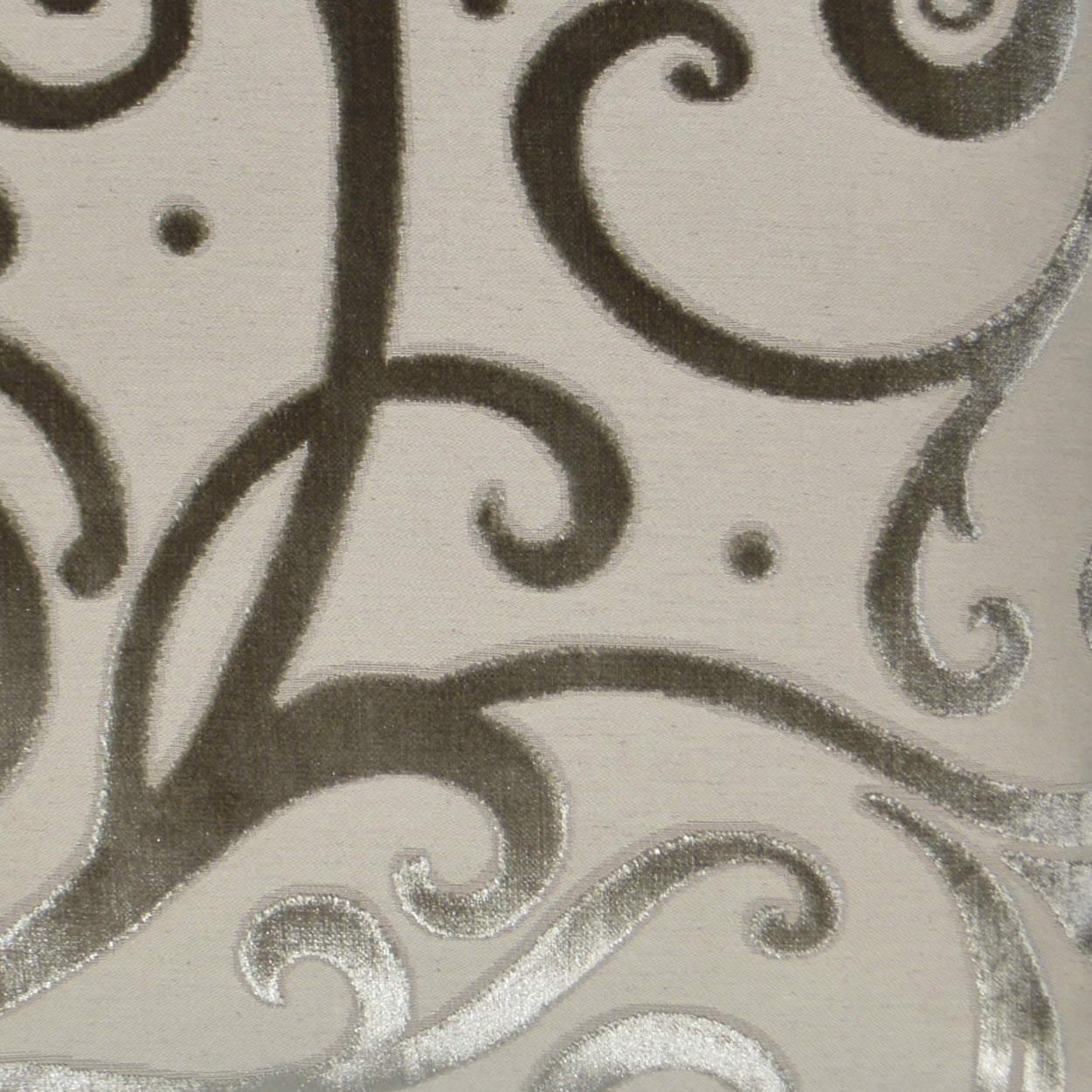 Cream fabric with silver-grey scroll damask pattern and subtle metallic sheen; elegant decorative textile.