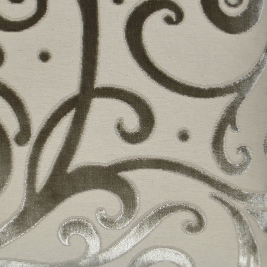 Cream fabric with silver-grey scroll damask pattern and subtle metallic sheen; elegant decorative textile.