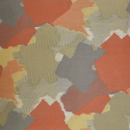 Pillow with Tangerine Abstract splatter pattern in orange, tan, mustard, olive and gray; 24 x 24 inches.