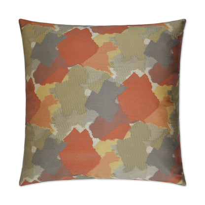 Abstract splatter-pattern square decorative pillow in tangerine hues on textured fabric.