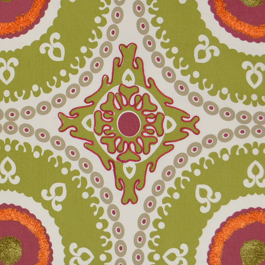 Olive-green fabric with lime-green and pink ornamental medallion pattern; central diamond sun motif and repeating borders.