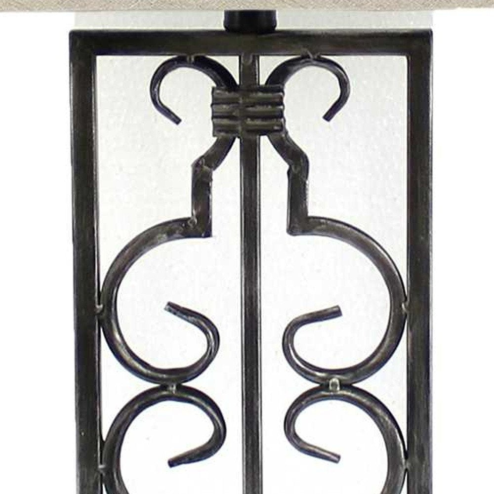 Black wrought-iron decorative railing panel with mirrored scrolls and a central vertical bar.