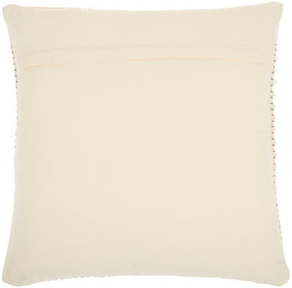 Cream square throw pillow with pom-pom edge trim; soft fabric, decorative accent.